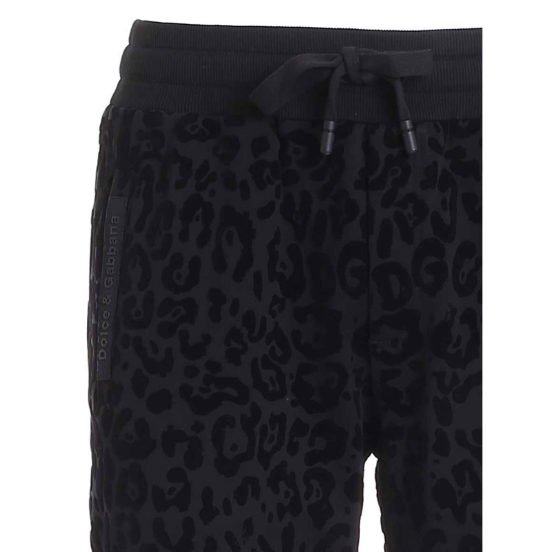 JOGGING PANTS WITH FLOCKED LEOPARD PRINT