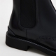 LEATHER ANKLE BOOT WITH HOLES AND DOVETAIL