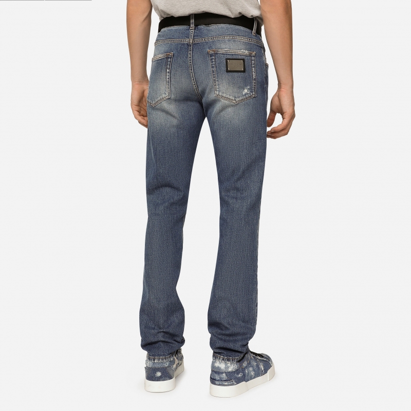 Light blue slim-fit stretch jeans with abrasions