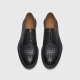 LACE-UP SHOES IN BLACK WOVEN LEATHER